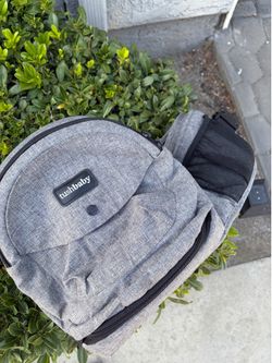 Tushbaby carrier and attachment