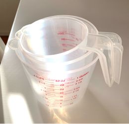PLASTIC MEASURING CUP SET / NEW