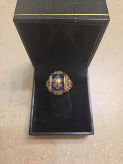 10 k gold class ring.  Weight is 7.4 grams