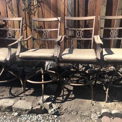 4 outdoor  metal chairs $100 for alll
