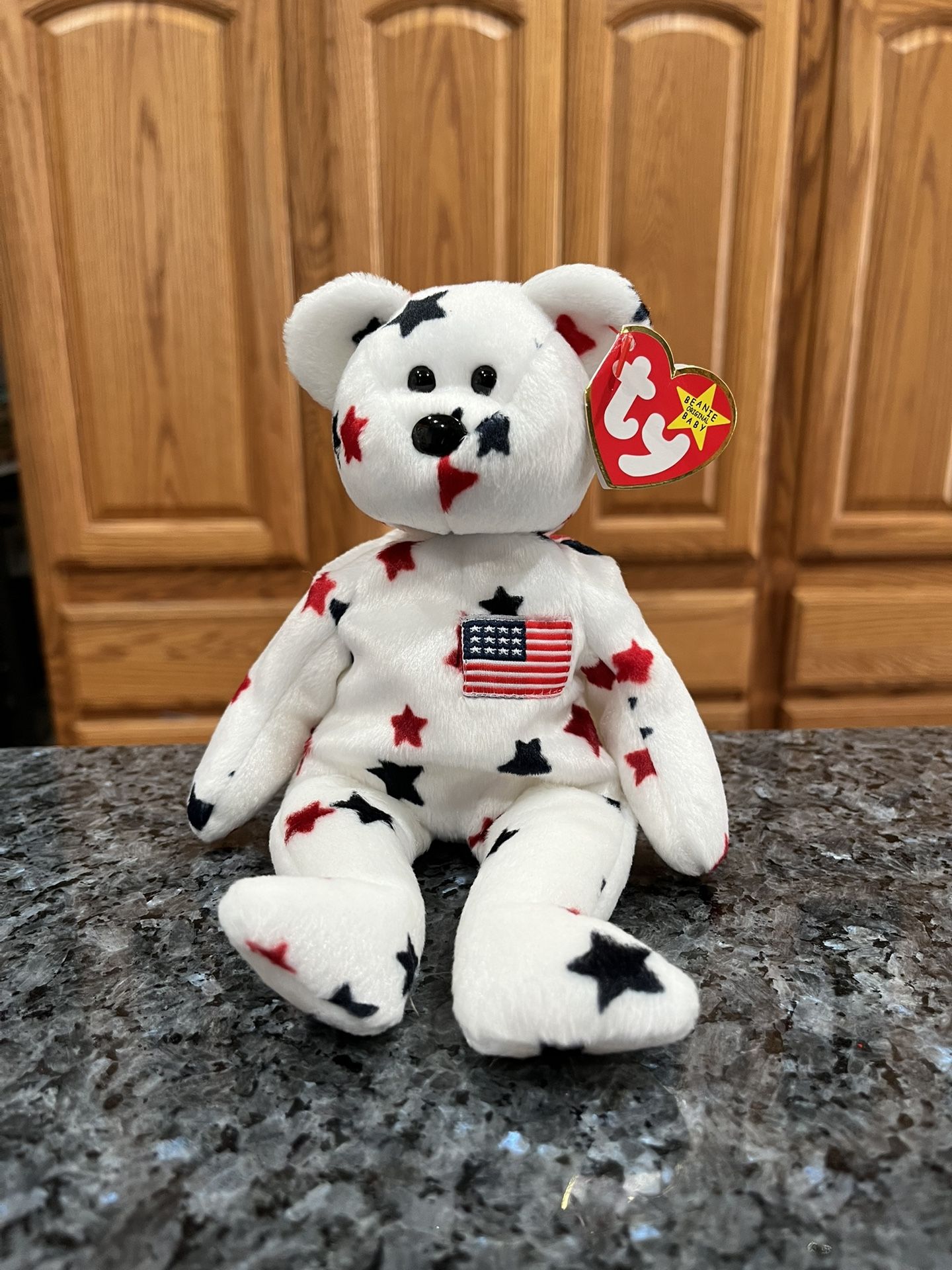 Ty Beanie “Glory” The Bear 1997 Retired Plush Toy. Brand new with tags. Had been on display with a Ty Beanie Babie Collection. Smoke free home