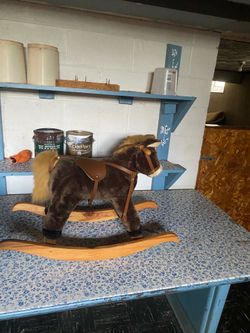 A brown rocking horse