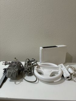 Nintendo Wii Console White RVL 001 with Bowling Ball Controller.