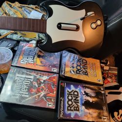 Playstation 2 guitar hero guitar and 4 games.
Working great