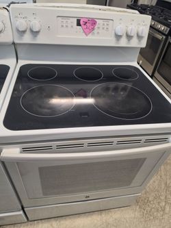 Used white electric and gas stoves, 325 to 350