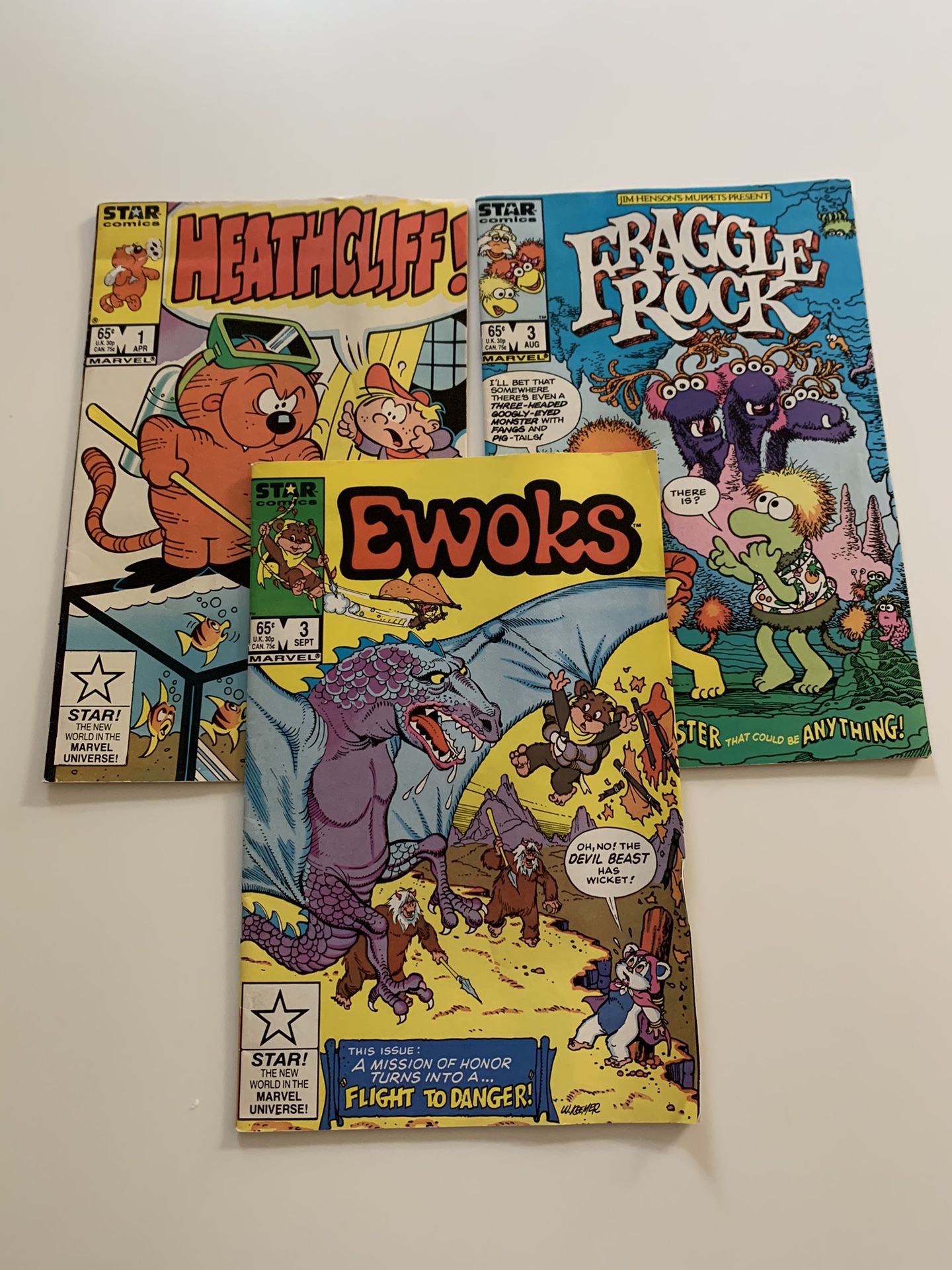 MARVEL/STAR Comic Books From 1985: Heathcliff (4/1/85), Fraggle Rock (8/3/85) and EWOKS (9/3/85) in Very Good Condition (ungraded)