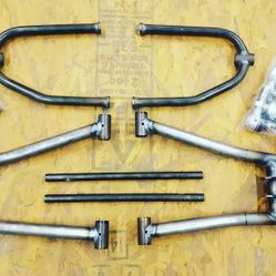 Our dune light weight a arms ($620) and a 34" duner play axle with black beam ($740)