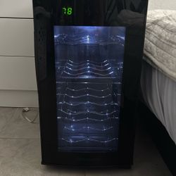 A wine refrigerator Fits Eight Bottles 