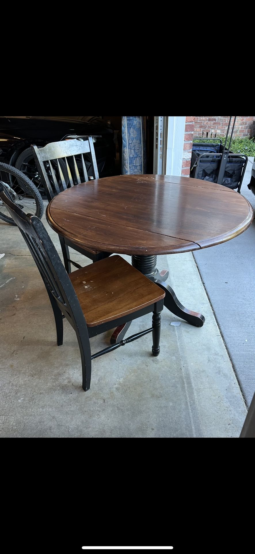 Round Pedestal Table with Two Chairs