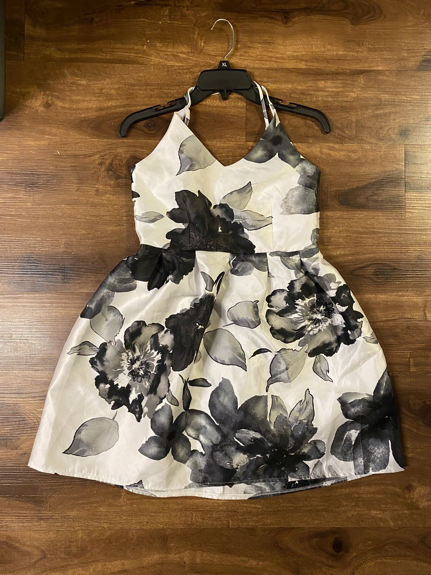Brand New Woman’s Crystal Doll brand Black and White colored Floral Criss Cross Dress