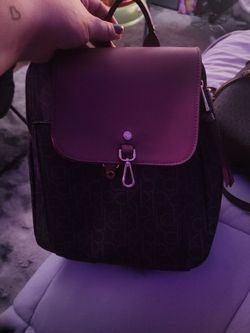 calvin klein backpack purple and brown with gold zipper