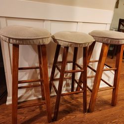 (3) Wood stools/beige cushions $30