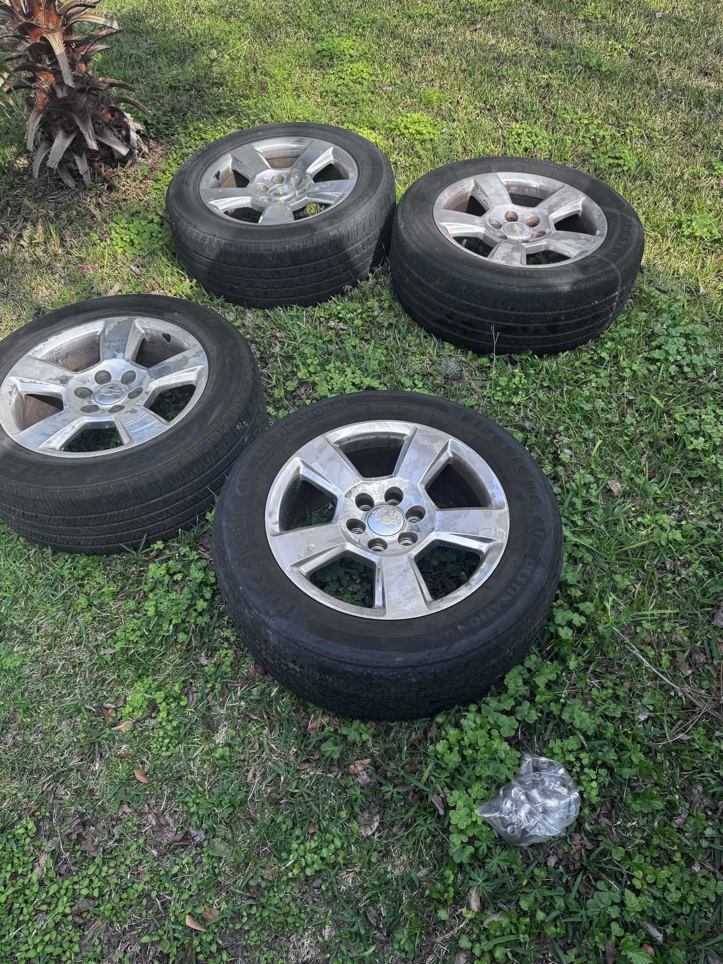 4 stock rims and tires Chevy Silverado 22s