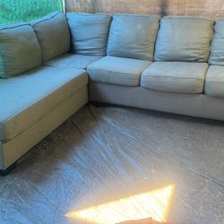 Brown color couch, no stains no rips . We sell all the time delivery extra 40 local.