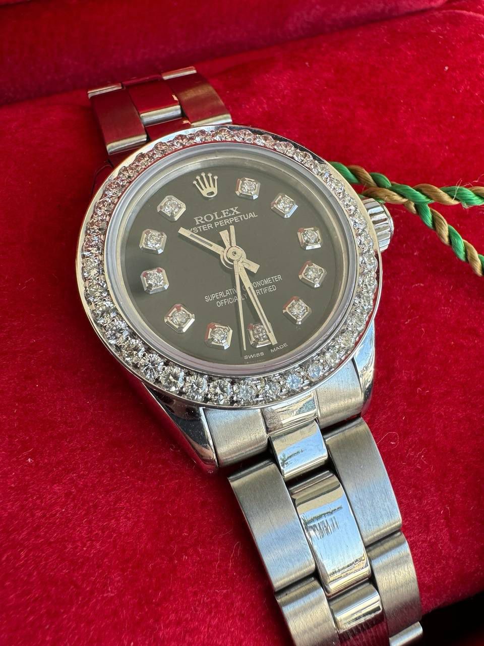 Rolex Oyster Perpetual no date 24mm black diamond dial white gold diamond bezel box and papers lady watch
