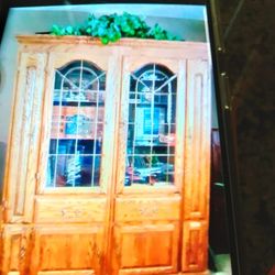 Very Large Oak Cabinets They're 24 In Deep They Hold Your CDs Or Movies Or Whatever You Want They Go Together Or You Can Split Them Apart