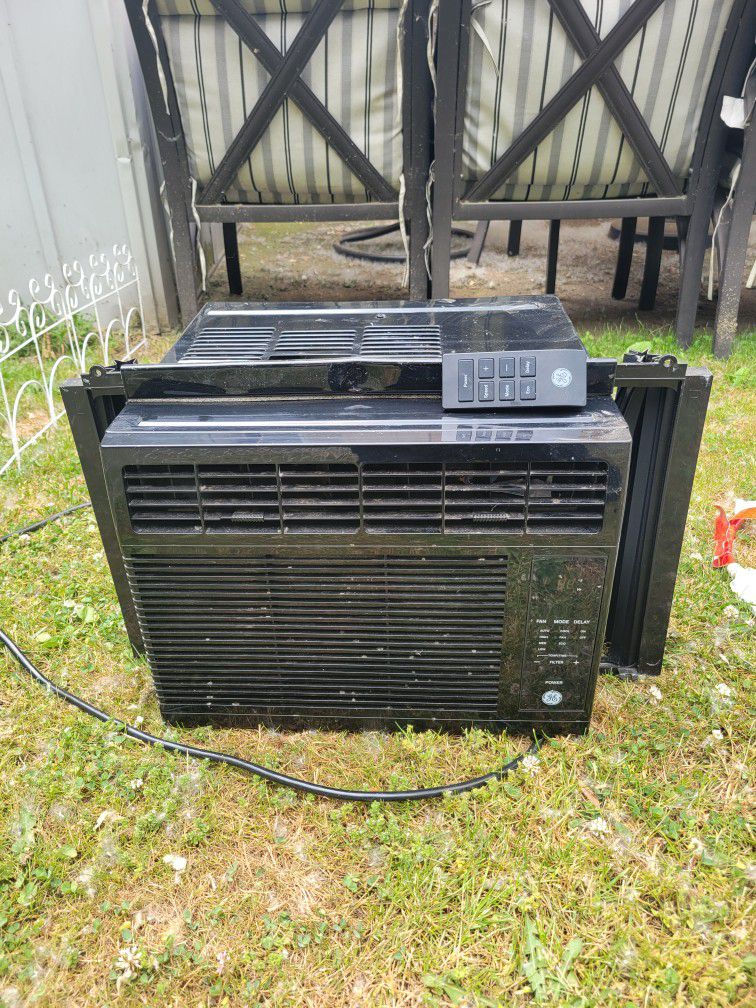 2 Black GE 5050 BTU Air Conditioners