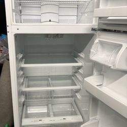GE 18 cu ft top freezer refrigerator (Model GTS18GTHWW).