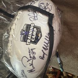 collectible, white panel football signed by various players from the 2021 Las Vegas Raiders Training Camp