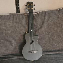 Ukulele With Case And Extra Strings 