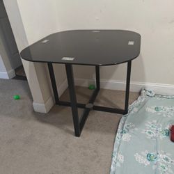 Glass top dining table for 4