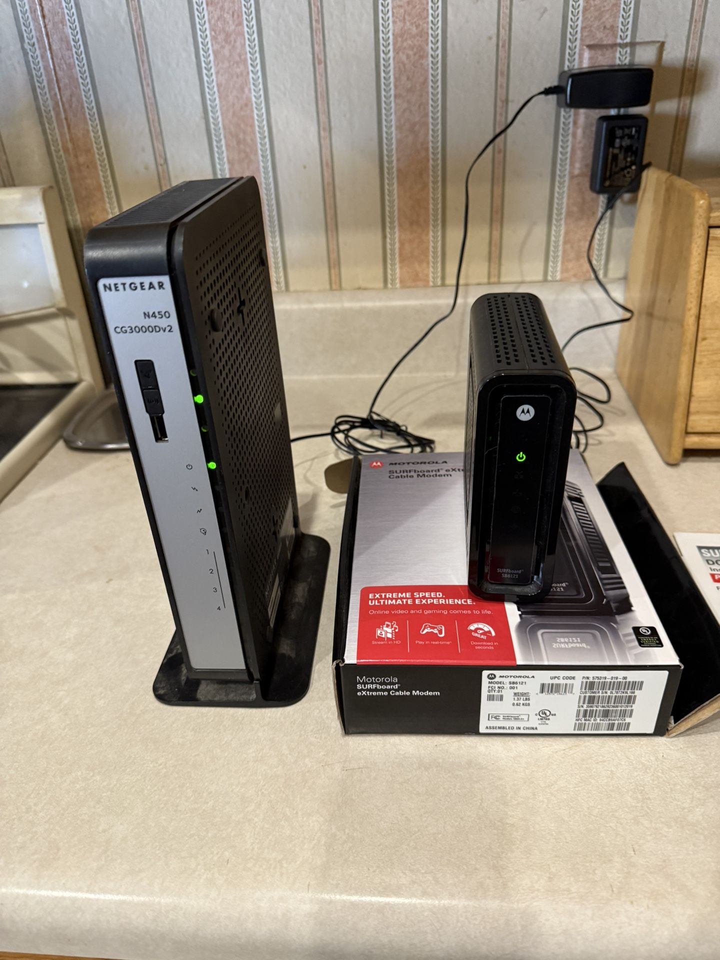 2 Cable Modems, Netgear And Motorola