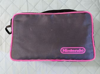 Pink NES cartridge carrying case