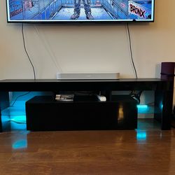 Free TV/entertainment stand with storage compartment