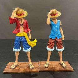 One Piece Monkey D. Luffy figures depicting the character in different outfits, commonly known as a "2-Pack Hat Press Pose" collectible