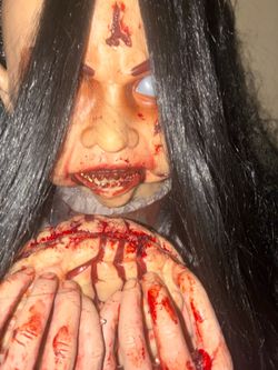 This is a rosemary zombie girl in good condition.Pick up Only.