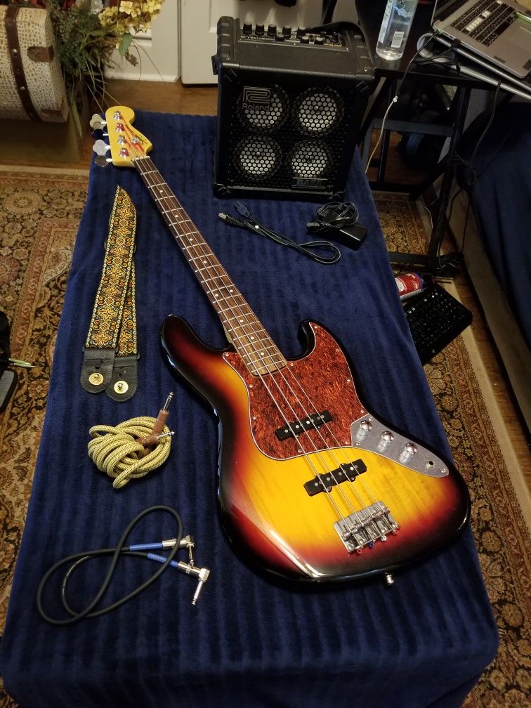 Squire Jazz Bass (Fender) w/ Bass Cube RX amplifier (Roland)