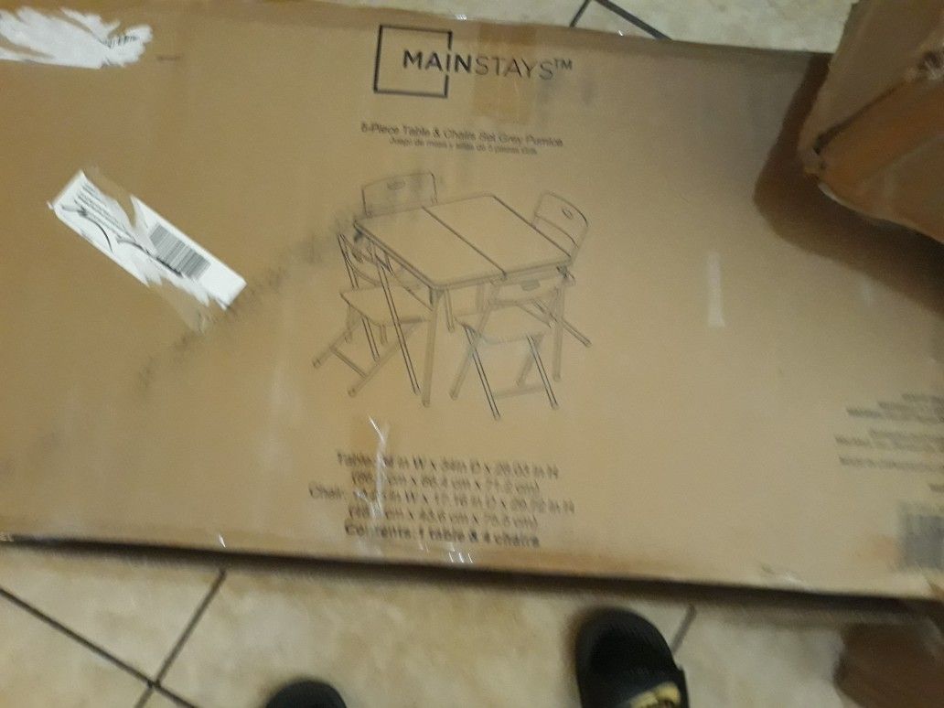 Folding table and Chair set new in box