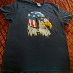 Spirit Of America Blue/Gray T-shirt , Size-XL EG , Nice Graphics Of Eagle Wearing Helmet With American Flag Theme . 