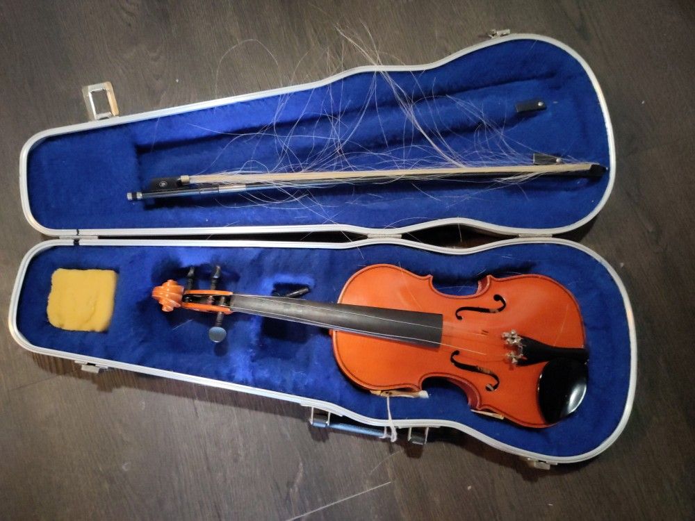 Child size violin and case