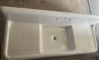 Cast iron double sideboard sink
