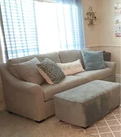light-gray, two-cushion sofa from American Signature