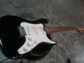 Electric guitar ..... perfect .... a duper deal $100