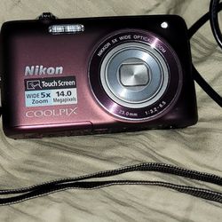 Nikon coolpix S4100 digital camera 15mp and wide angle zoom lens with charger 

