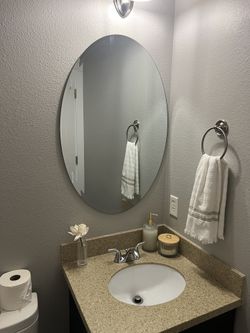Frameless Oval Mirror