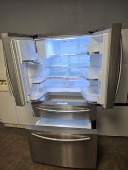 Sumsung stainless four door refrigerator