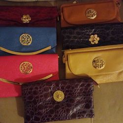 A Package Of 7 Beautiful Purses.  New.  $30 For all 7