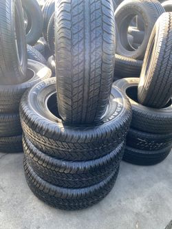 SET DUNLOP 265/70/17 SEMI NEW 95%TREAD LIFE $300 PRICE INCLUDE PROFESSIONAL INSTALLATION AND TAX