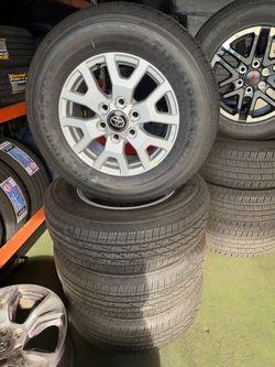 Set rin toyota and tires 245/70/17 firestone