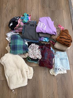Several bags of pre-teen & teen clothes priced individually