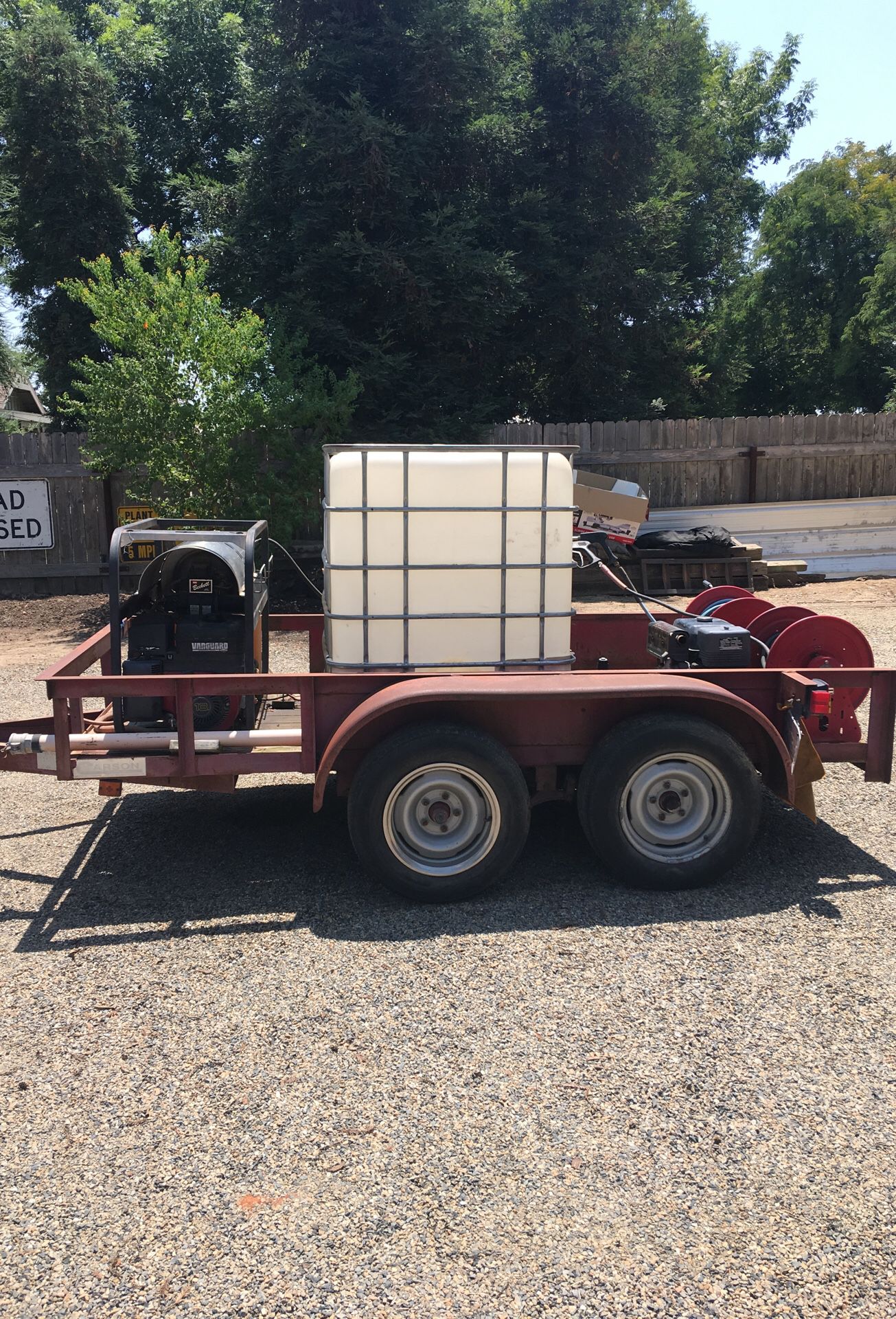 Carson trailer with 2 pressure washers and reels