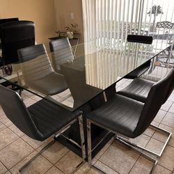 Beautiful Glass And Wood Based Dining Room Table With 6 Chairs 