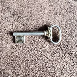 Vintage Napier style collectors key pendant. Spring loaded open/close