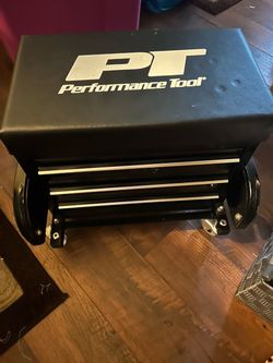 Seated tool box on wheels