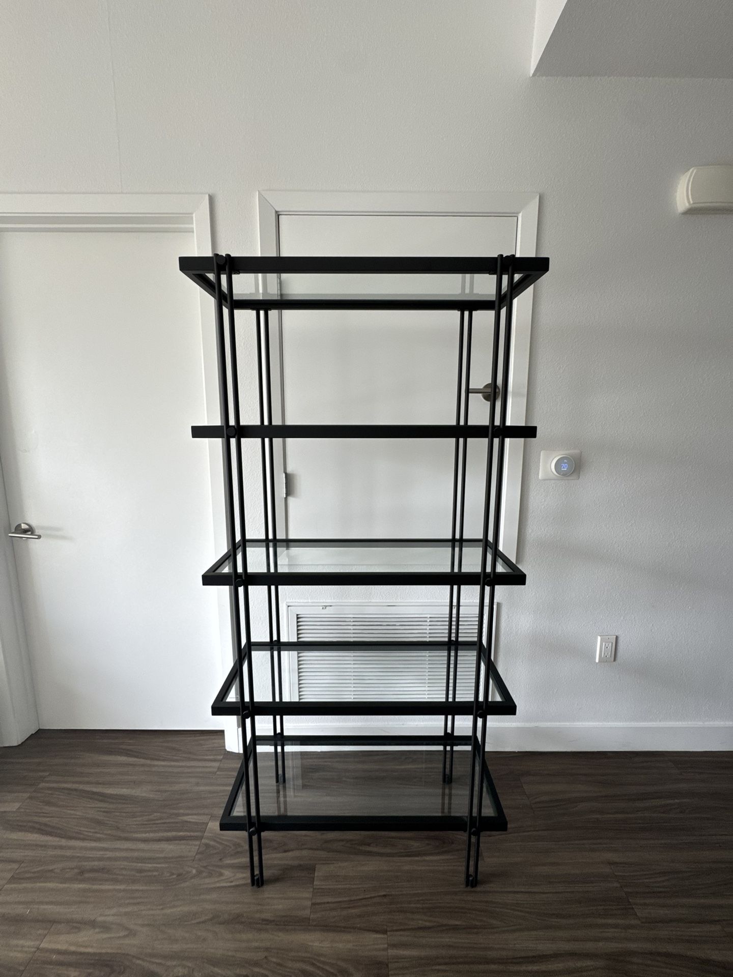 glass and metal bookcase