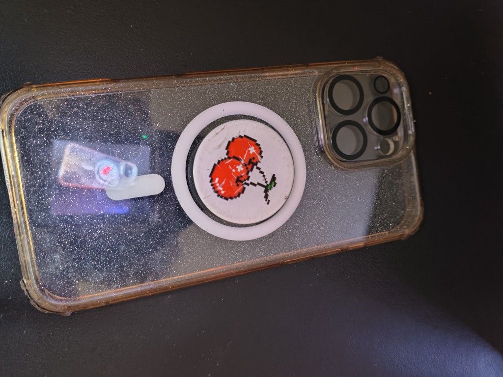 iPhone 16 Promax Case Gently Used With Free Pop Socket And Camera Protector